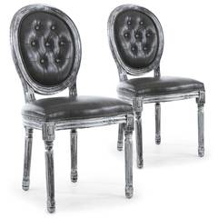 Lot de 2 chaises de style médaillon Louis XVI Bois noir patiné argent & Simili capitonné gris